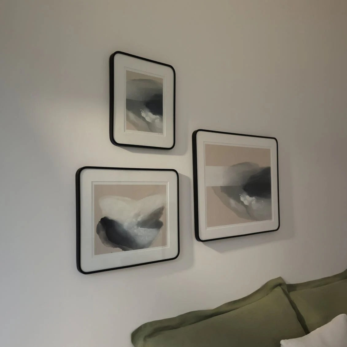 Modern wall art hanging on a living room wall, adding style and color to the space